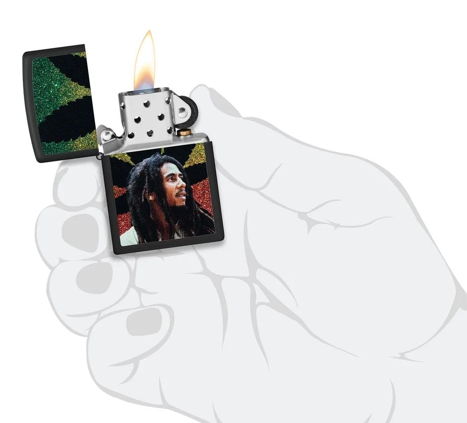 Diseño con la silueta de Bob Marley sobre una hoja Diseño con la silueta de Bob Marley sobre una hoja